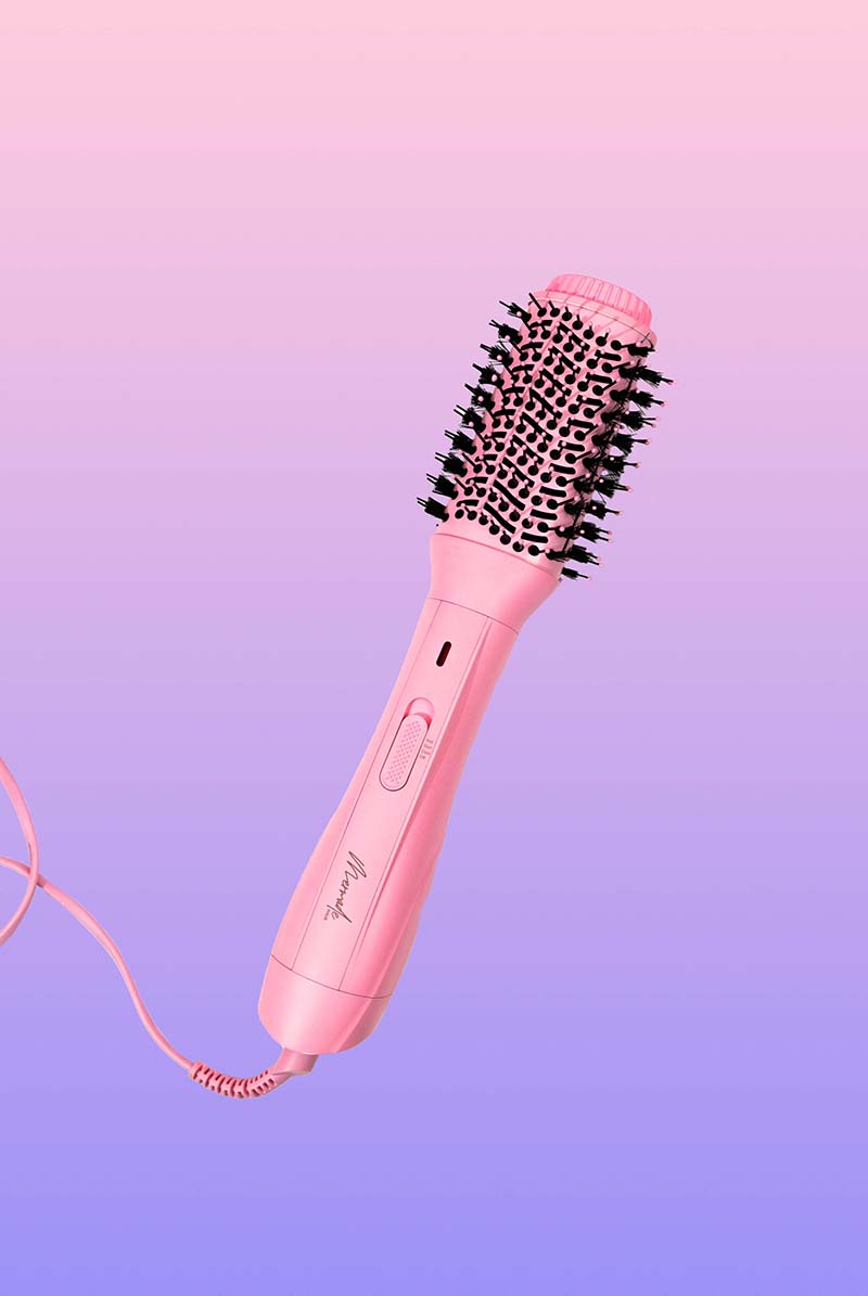 Simple Pink Product Photography for Hair Styling Tool Mermade Blow Dry Brush. Shot for Brand Mermade Hair. Styled Product Stills Photography by Megzie Makes