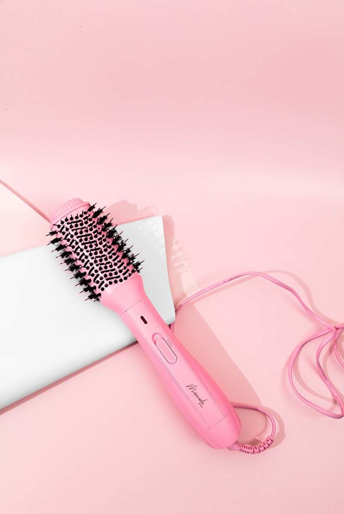 Simple Pink Product Photography for Hair Styling Tool Mermade Blow Dry Brush. Shot for Brand Mermade Hair. Styled Product Stills Photography by Megzie Makes