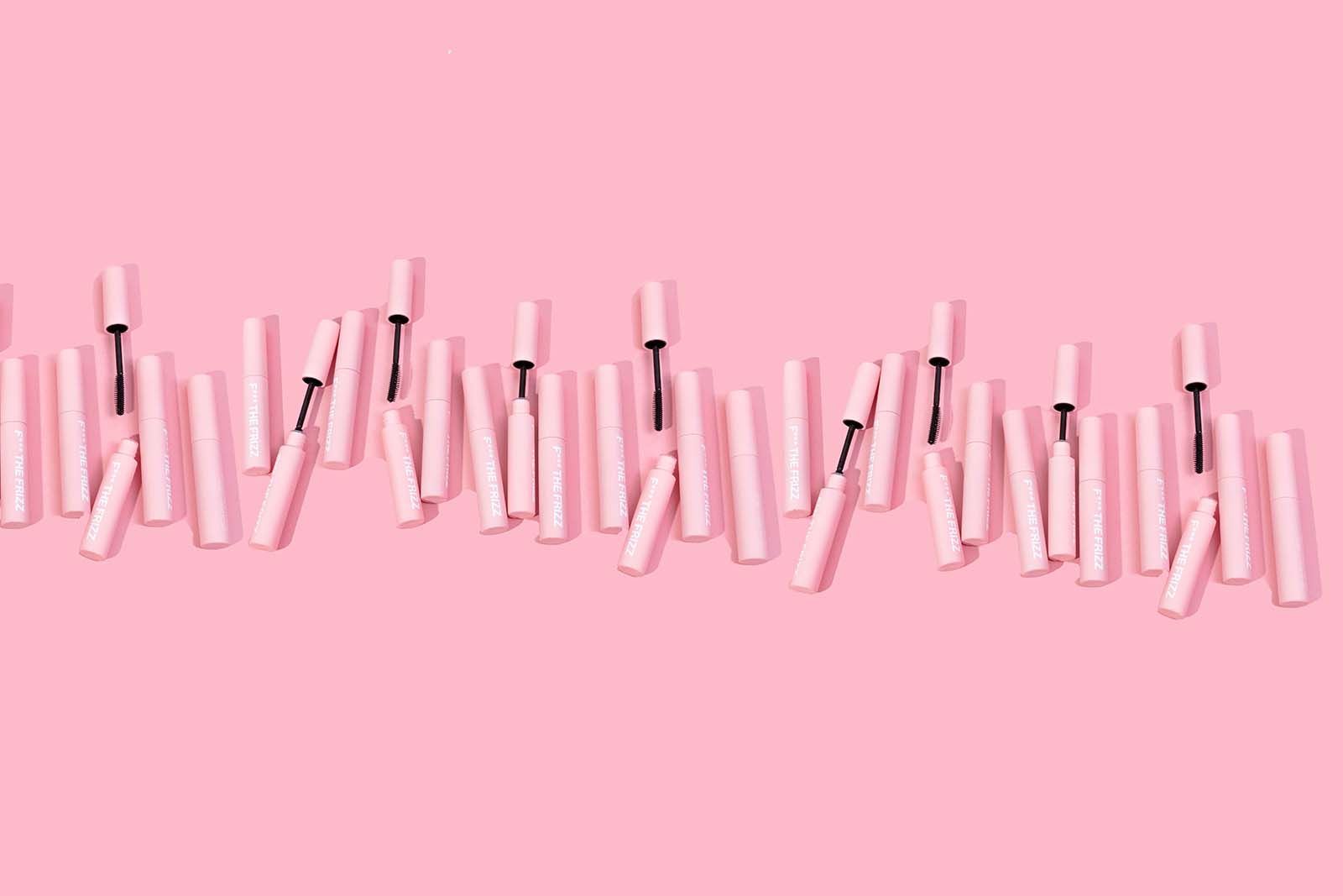 Pink Repeating Pattern Graphic for Anit Frizz Hair Wand. Styled content creation by Megzie Makes
