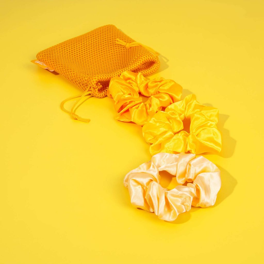 Creative Yellow Product Photography for Hair Scrunchies. Styled by Megzie Makes