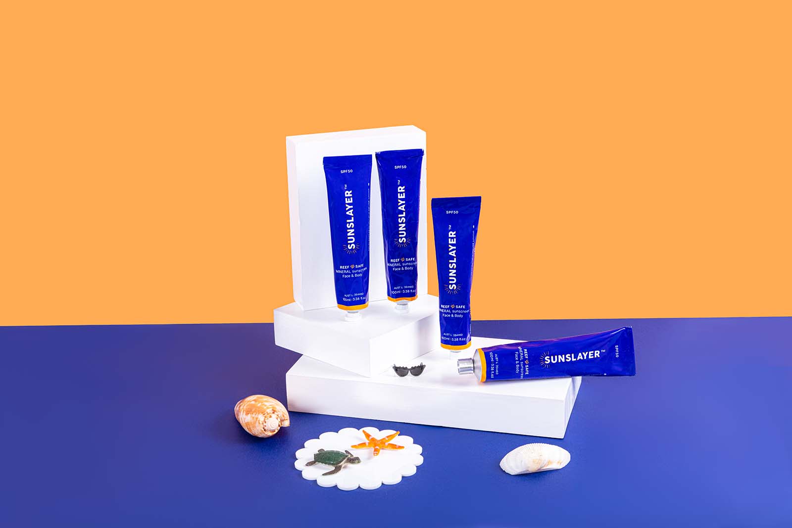Bold Product Photos for a Sunscreen Brand. Orange and Blue product photography by Colourpop Studio
