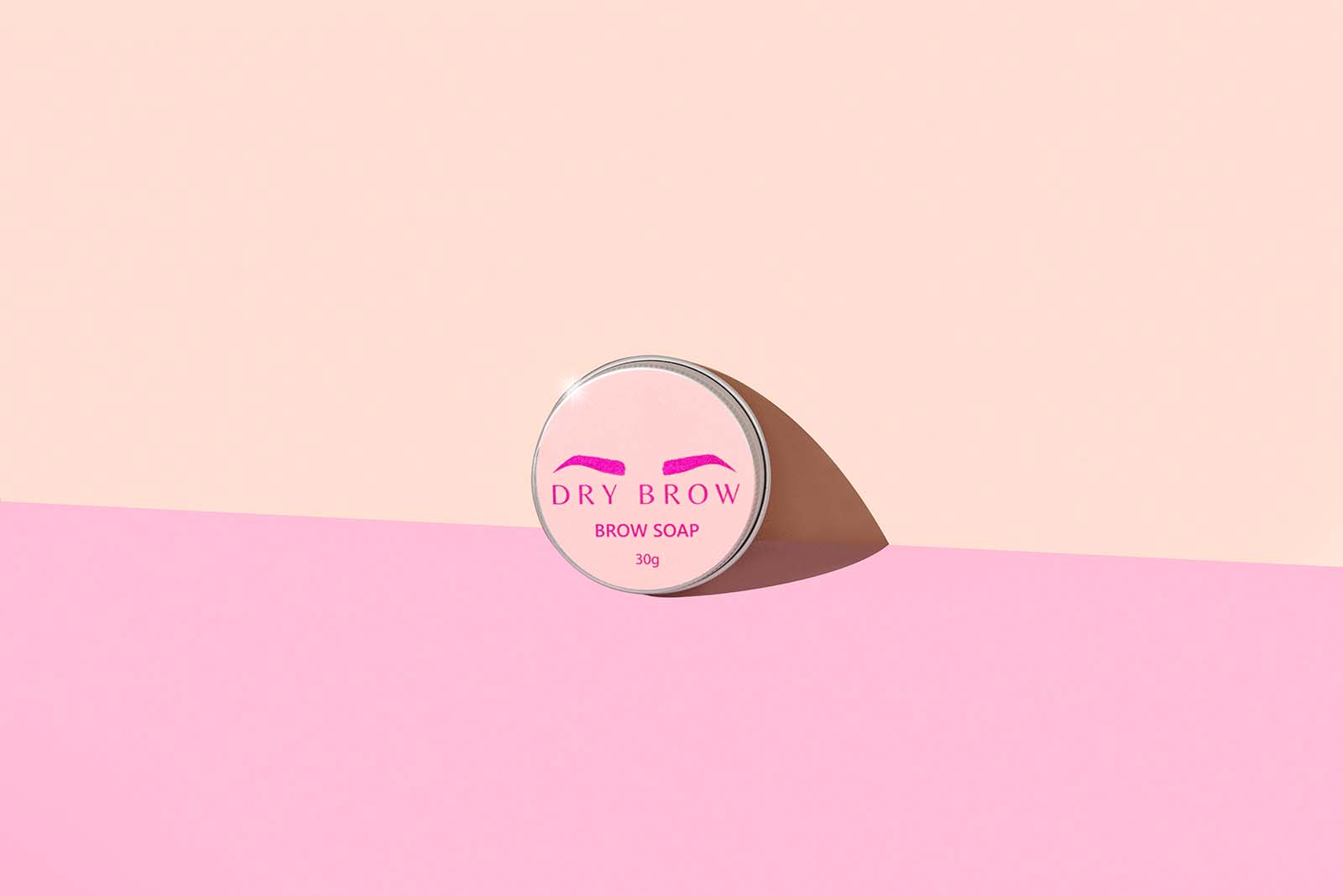 PInk and Orange Proudct photos for skincare brand dry brow. Pink aesthetic image styled by product photographer colourpop studio