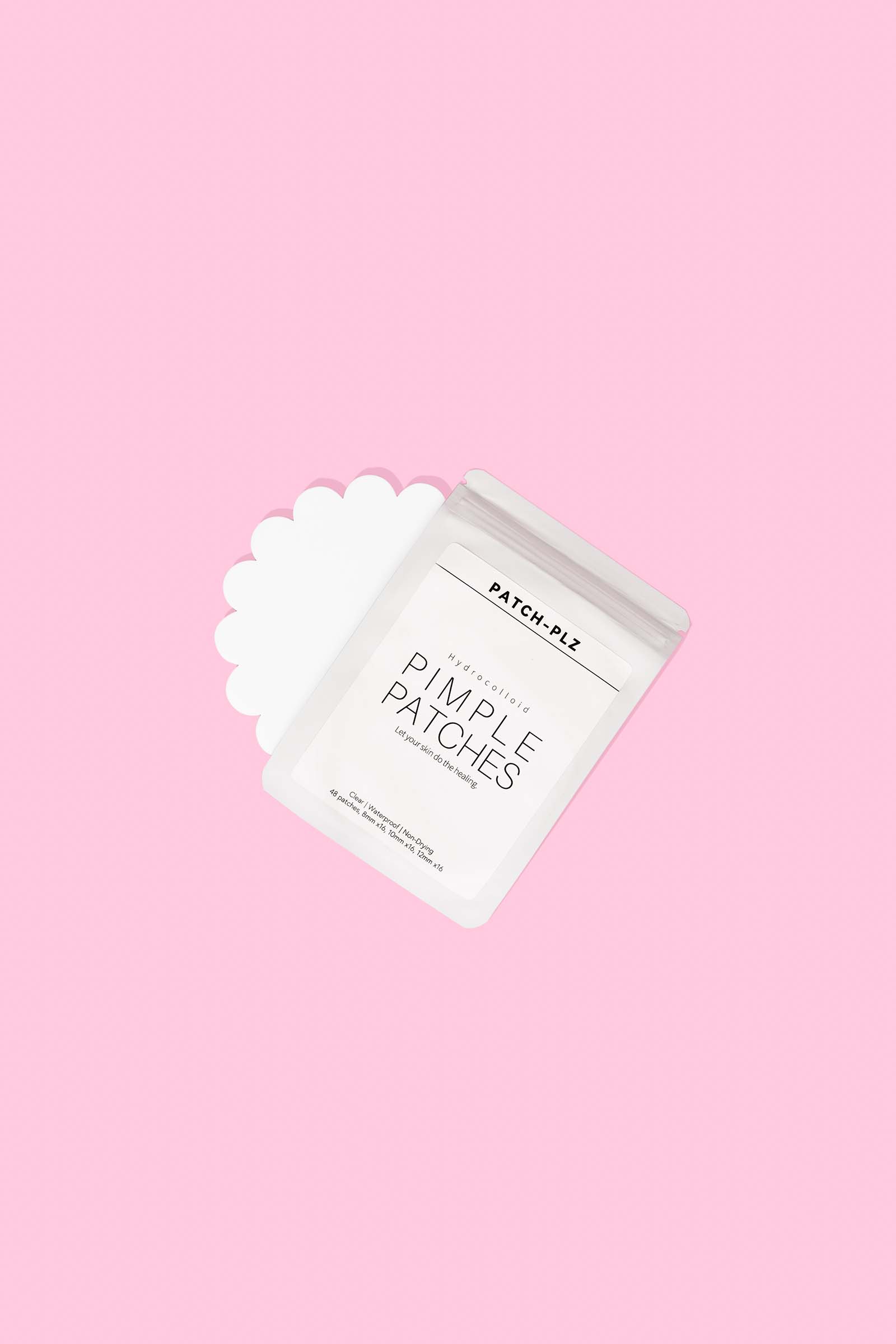 Pink product photography by Colourop Studio showcases Patch Plz's pimple-fighting patches